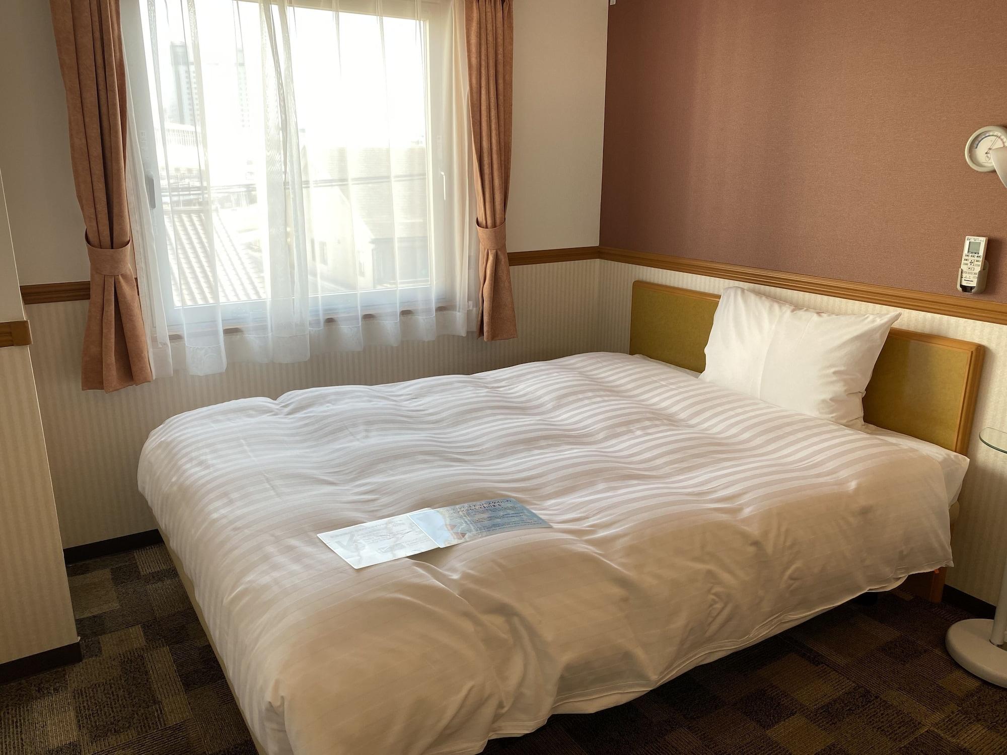Toyoko Inn Okayama Eki Nishi Guchi Migi Buitenkant foto