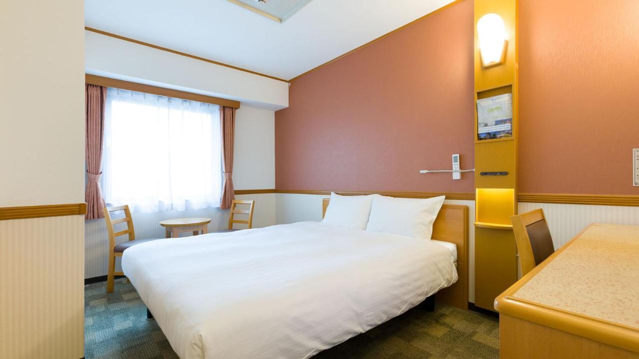 Toyoko Inn Okayama Eki Nishi Guchi Migi Buitenkant foto