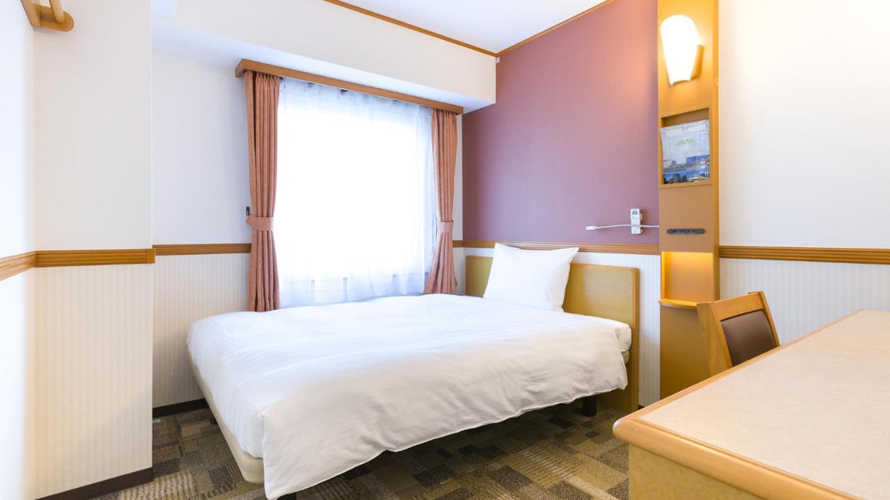 Toyoko Inn Okayama Eki Nishi Guchi Migi Buitenkant foto